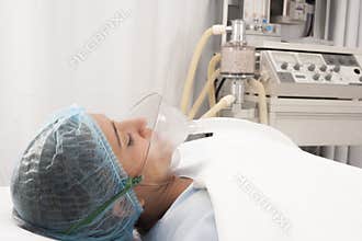 Beautiful patient receives anaesthetic