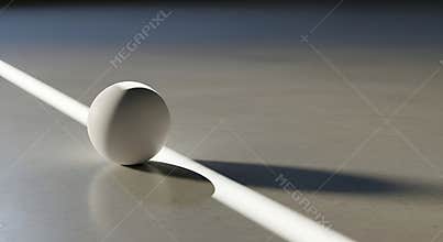 The white ball sits on a line on the floor with a shadow cast to the right side