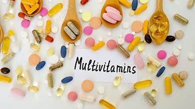 Various tablets and capsules, supplements and vitamins. Selective focus.