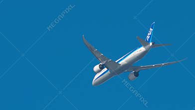 ANA All Nippon Airways Boeing 787-9 JA883A climbing in blue sky