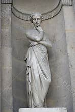 Statue woman cross arms