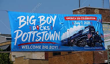 Pottstown, Pennsylvania, U.S.A - Jul 2, 2026 - The large event banner featuring Big Boy locomotive illustration promoting America