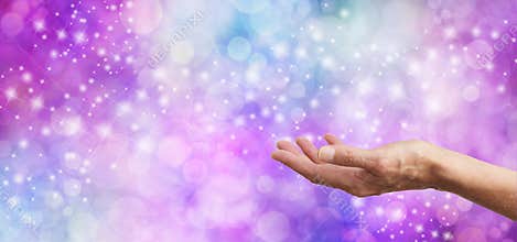 Sparkling Bokeh Glitter background and open hand