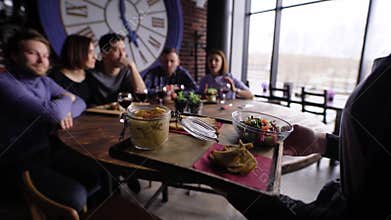 Crop shot of waiter delivering food