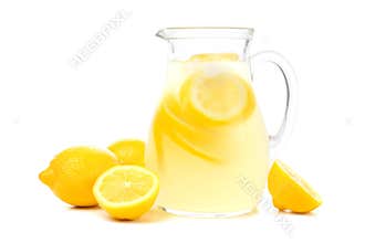 Pitcher of lemonade with lemons isolated on white