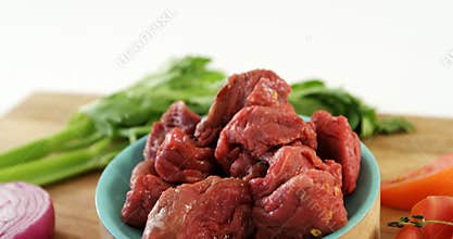 Marinated meat pieces and ingredients