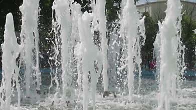 Several streams of water of city fountain