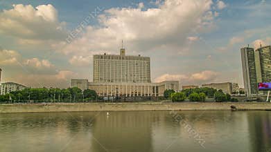 The flag of Russia and The coat of arms of the Russian Federation on the top of The House of the Government of the