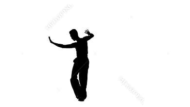 Solo man is dancing elements of ballroom dancing. Silhouette, studio