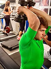 Fitness men friends in gym workout weights with equipment.