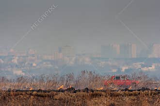 Beginning fire in the background of the city