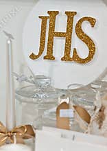 JHS - First Holy Communion articles on shelf in a shop