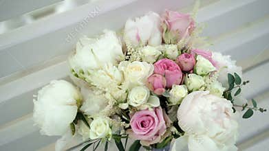 Wedding bouquet on bench