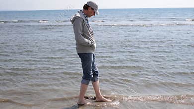 Barefoot man in the sea