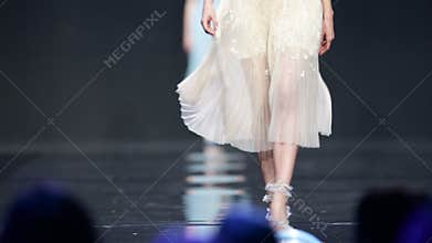 Fashion show runway beautiful blue dress