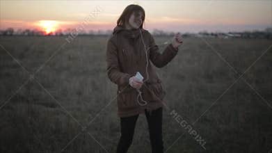 Girl dance with mobile phone