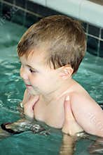 Swim lesson with a little boy