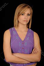 Teenager with arms folded