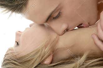 Couple natural kiss closeup portrait
