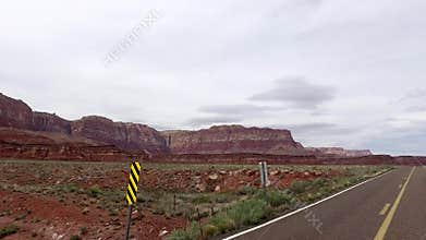 Incredibly beautiful spring landscape in Utah. Road driving POV. Geological formation weather water erosion. Nature