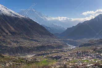 Blossom in Hunza valley with Rakaposhi background, Gilgit Baltistan, Pakistan