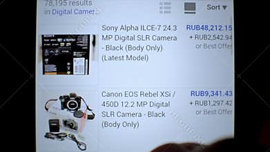 Surfing online auction ebay website shop on mobile