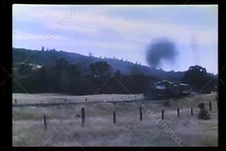 Wide angle view of locomotive traveling through countryside