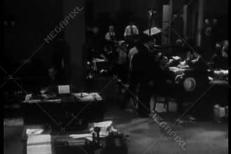 Wide shot people working in busy office