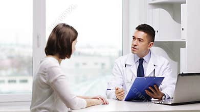 Doctor and young woman meeting at hospital