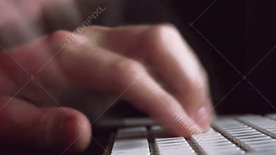 Male Hands on Computer Keyboard in Dark Room, Fast Typing