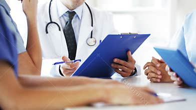 Group of doctors at meeting in hospital