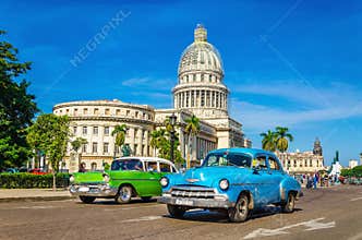 Classic American cars and Capitol in Havana, Cuba