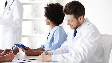 Group of doctors on seminar or lecture at hospital