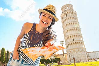 Woman giving pizza in front of tower of pisa