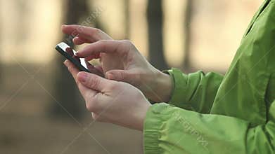 Woman using smartphone, chatting