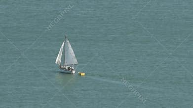 Yacht setting a sail
