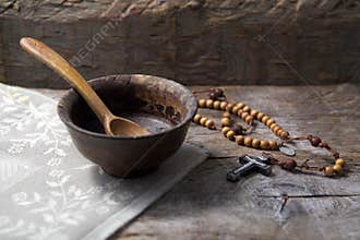 Fasting, Lent. Cup and cross.