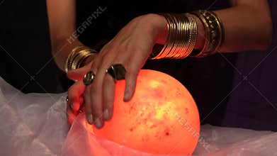 Fortune teller using crystal ball
