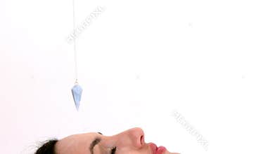 Woman at crystal healing session
