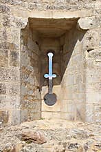 Arrowslit was drilled in ramparts in Falaise (France)