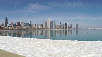 Chicago skyline reflecting on ice