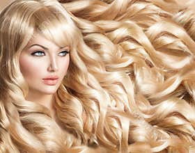 Beautiful girl with long curly blond hair