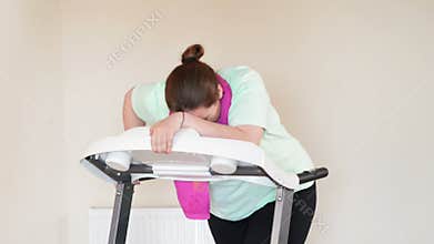 Fat woman running treadmill