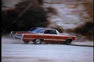 Car overturning on a mountain road