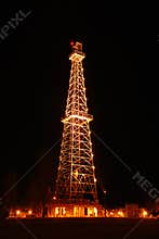Oil Derrick at Night