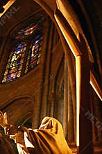 Statue and cross in Notre Dame