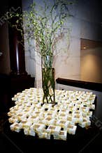 Table topped with wedding favors