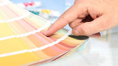 Choice from palette color scale, hand pointing