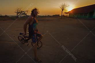 Happy man biking