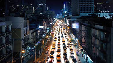 Beautiful Illuminated Road Through City At Night